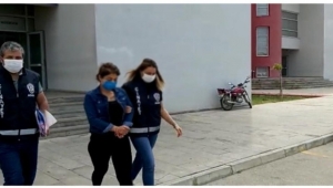 Genç kadın eşini vurarak ağır yaraladı
